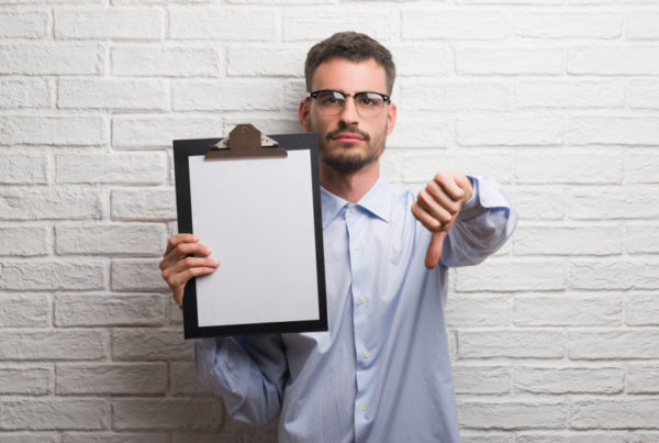 man showing thumbs down